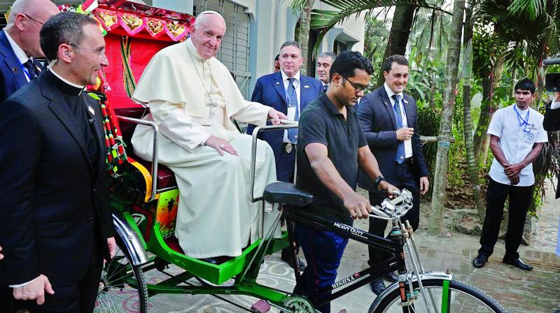 Pope Franchis ride the rickshaw when traveling Dhaka