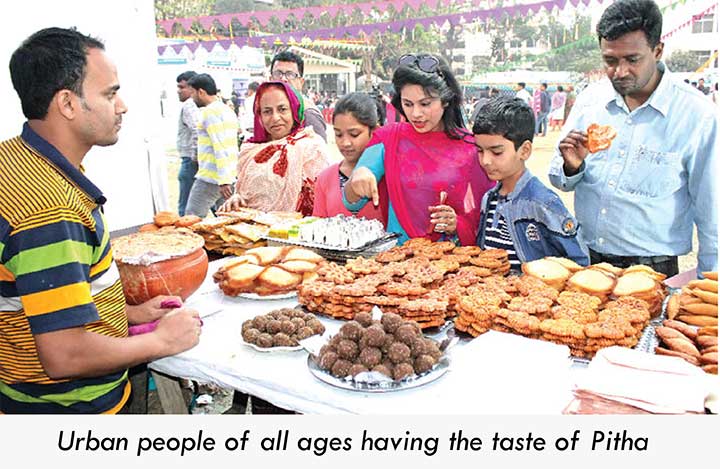 People paying a visit at Pitha Utsab